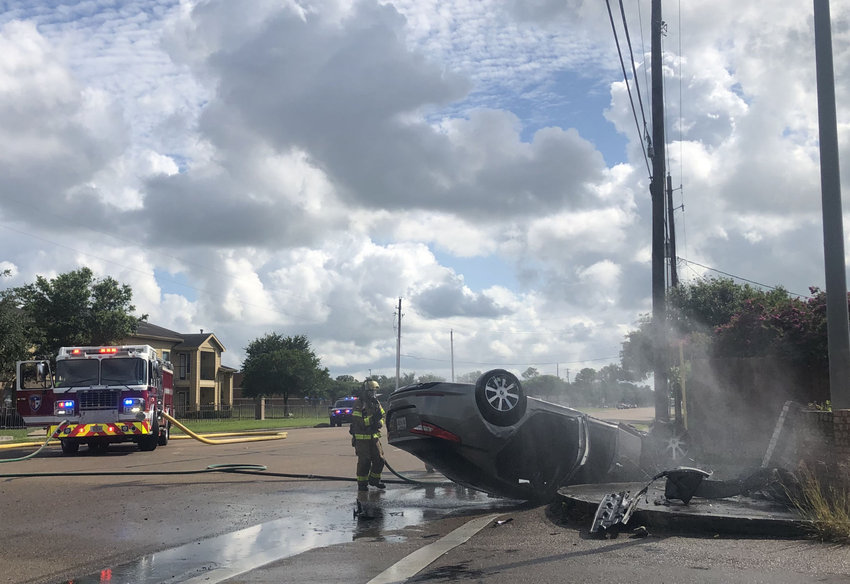 Car flips on Salem Road